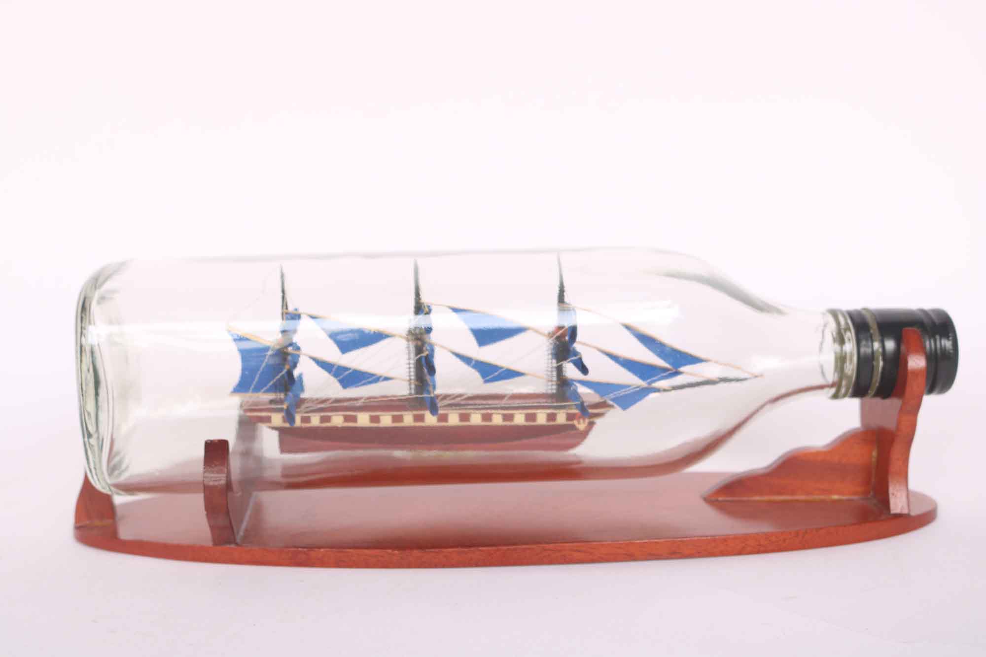 Blue Ship Model In A Horizontal Square Bottle 10.6" 4 Blue Ship Model In A Horizontal Square Bottle (1) Speed Boad Model